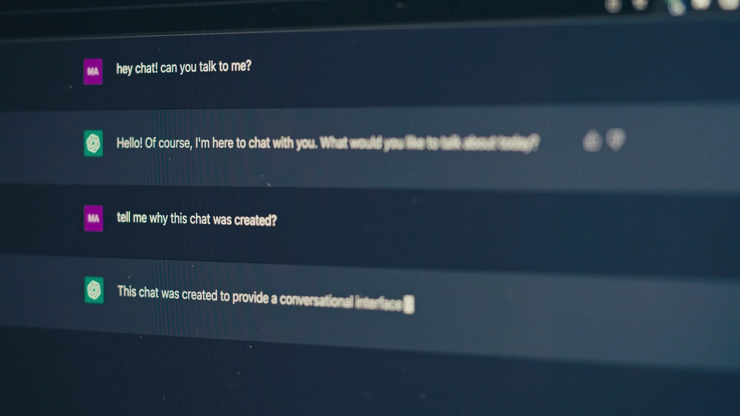 Screenshot of a chat interface with messages from two participants, labeled 'MA' and an unnamed user, with messages about talking to each other and the purpose of the chat.