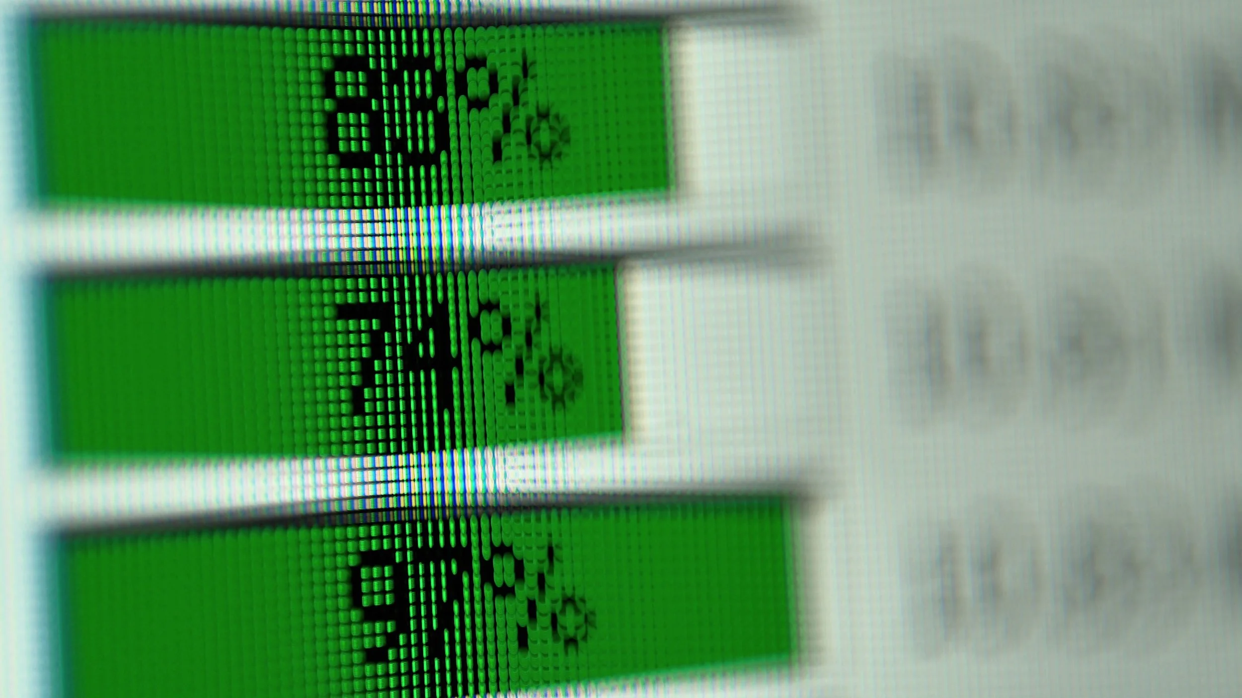 Close-up of a digital display with green LED dots showing the text 'Game'.