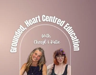 Two women smiling, with text above them that says "Growned Heart Centre Edition with Cheryl & Katie" on a pink background.