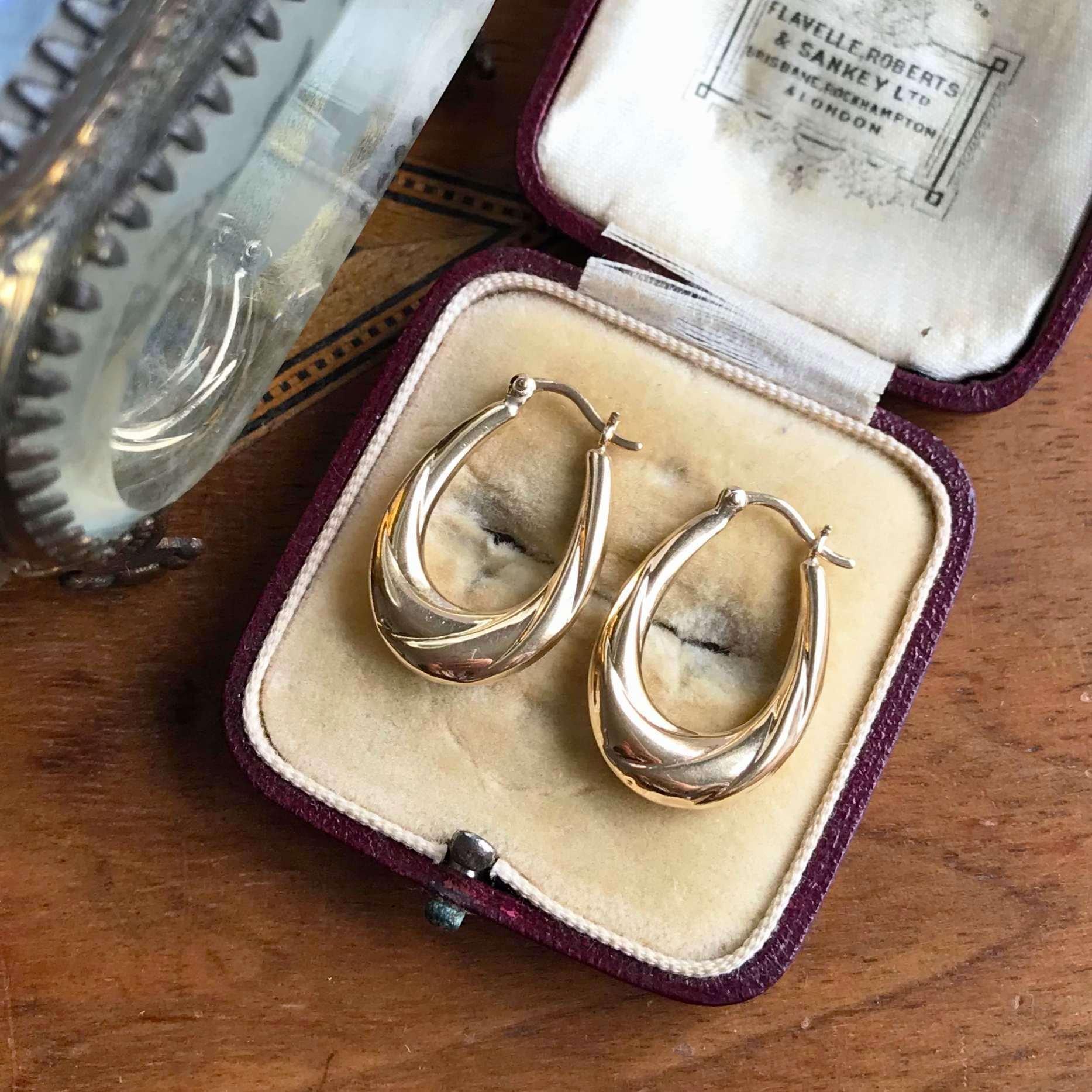 EA022 oval twisted hoops 10.jpg