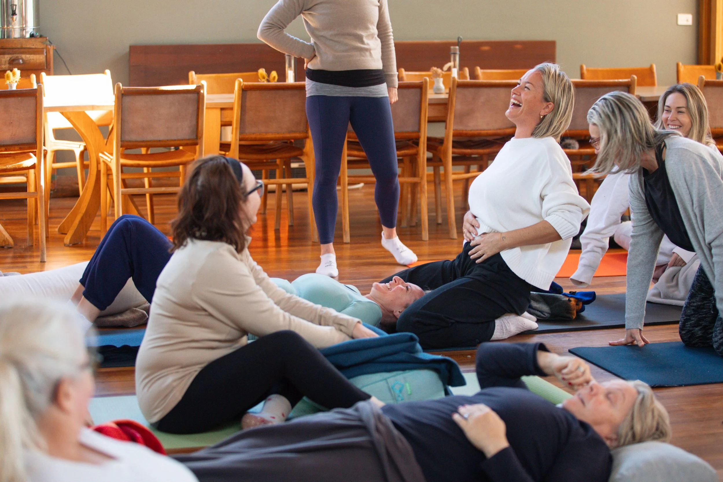 Tahlia Seinor teaching lymphatic bodywork techniques during Heal Well Method Foundations Training.