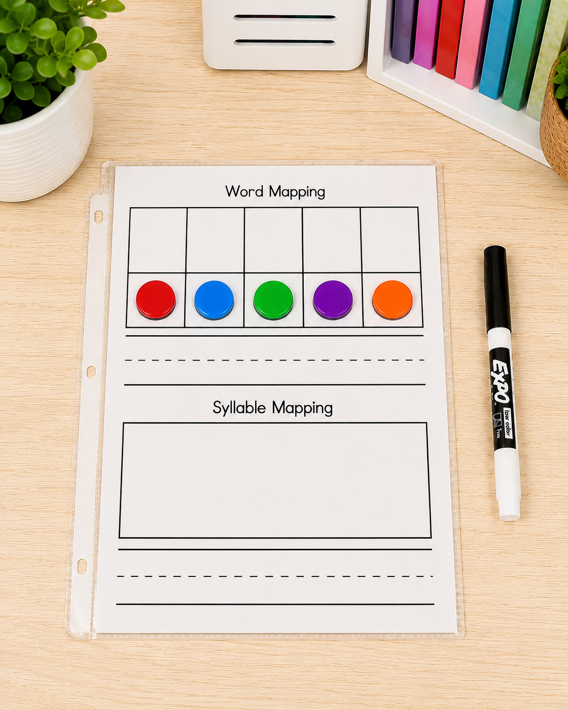 Word mapping mat with sound boxes and manipulatives used during explicit phonics intervention and structured literacy small groups.