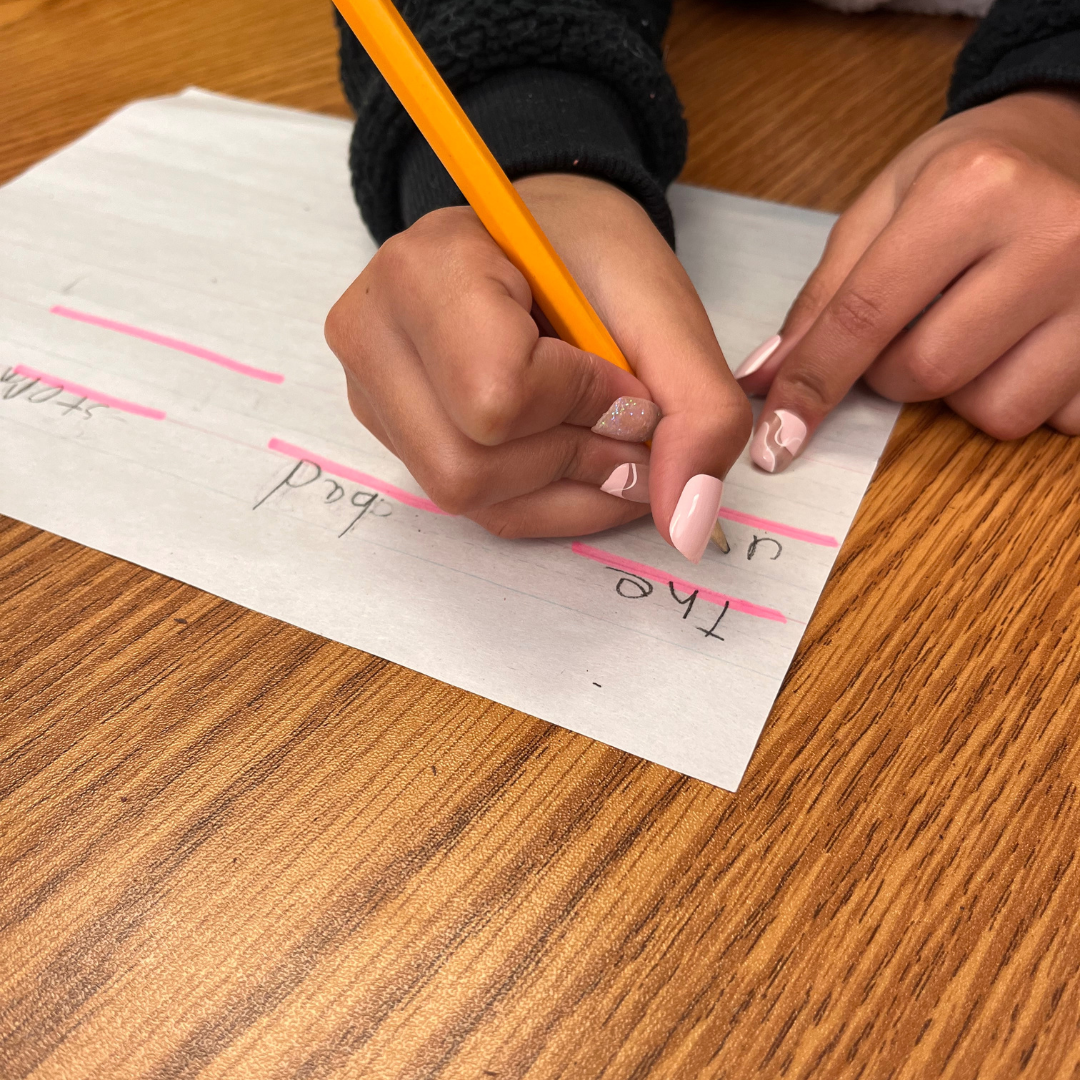 Student practicing dictation.