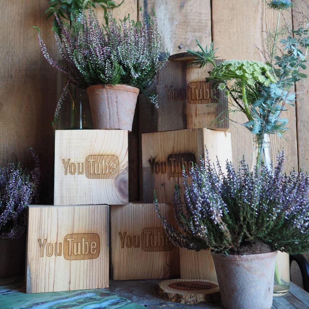 YouTube-Soho-Farmhouse-Exectuive-Event-Branded-Timber-Blocks-Flowers.jpeg