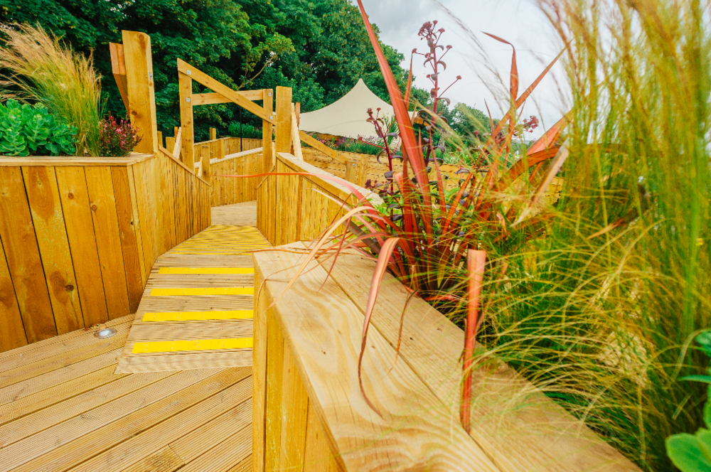Dreamland-Treehouse-Timber-Framed-Event-Structure-Ramp-Planter.png