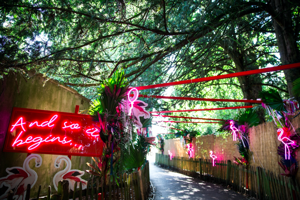 House-Festival-YouTube-Main-Entrance-Corridor-Neon-Flamingos.png
