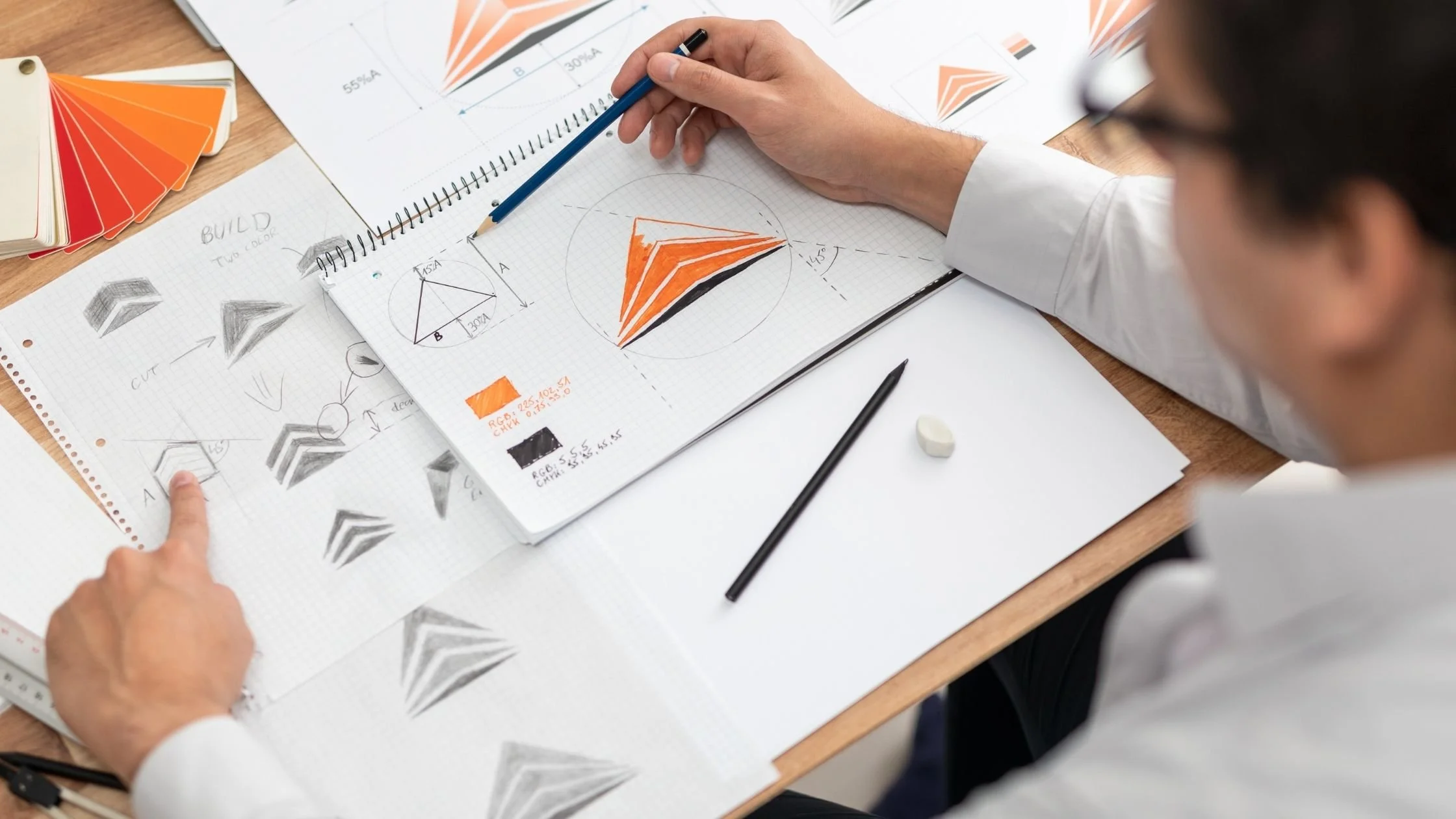 graphic artist branding creative process drafts and colour schemes