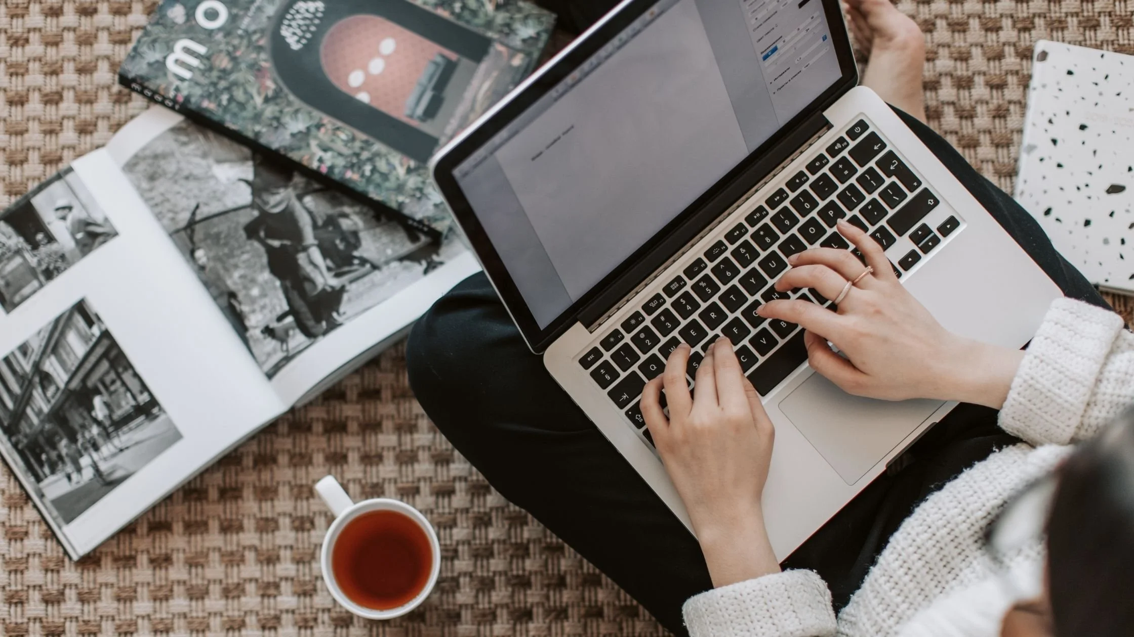 woman typing on laptop