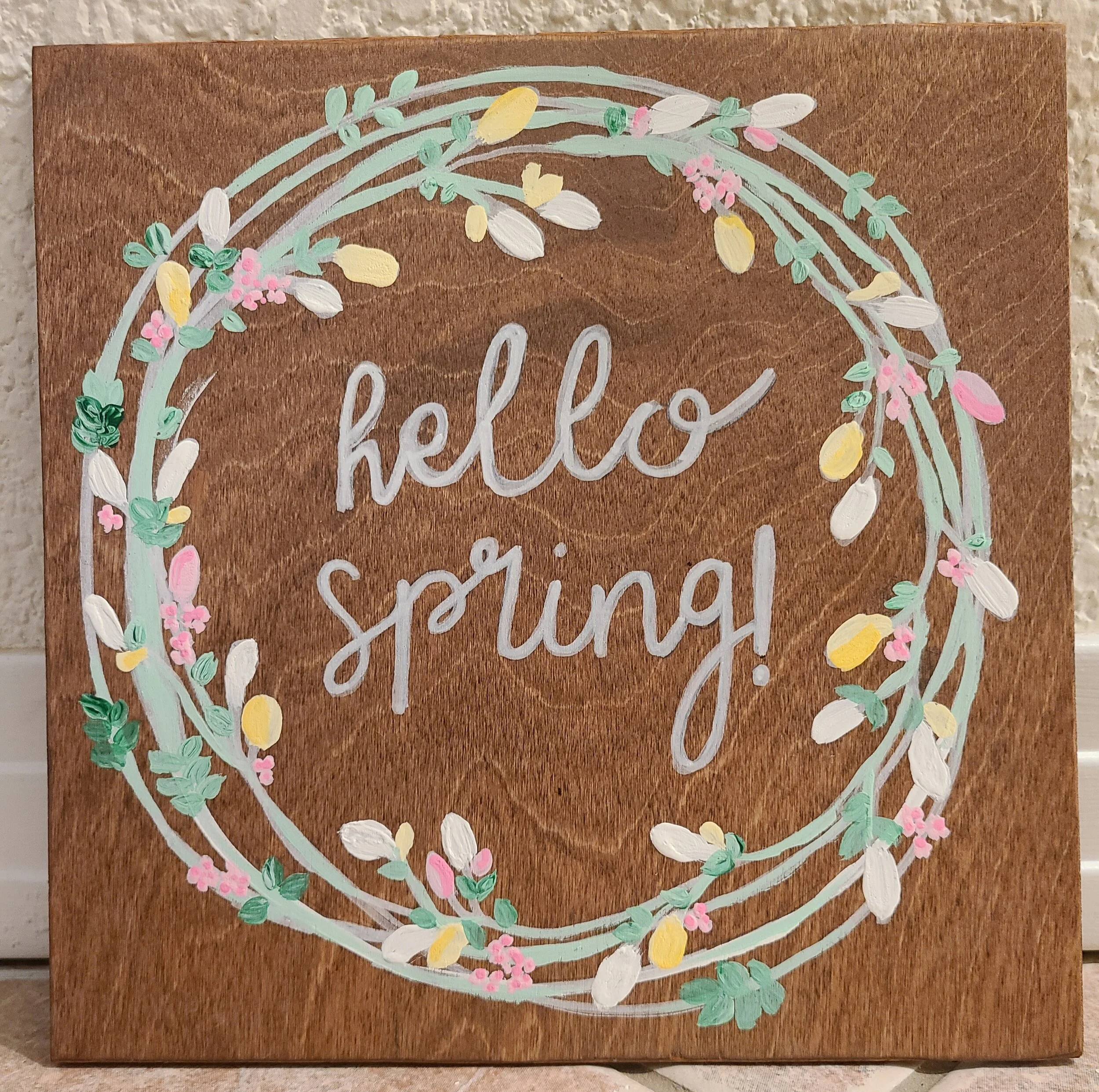 March Craft Night: painted text and wreath on wooden board