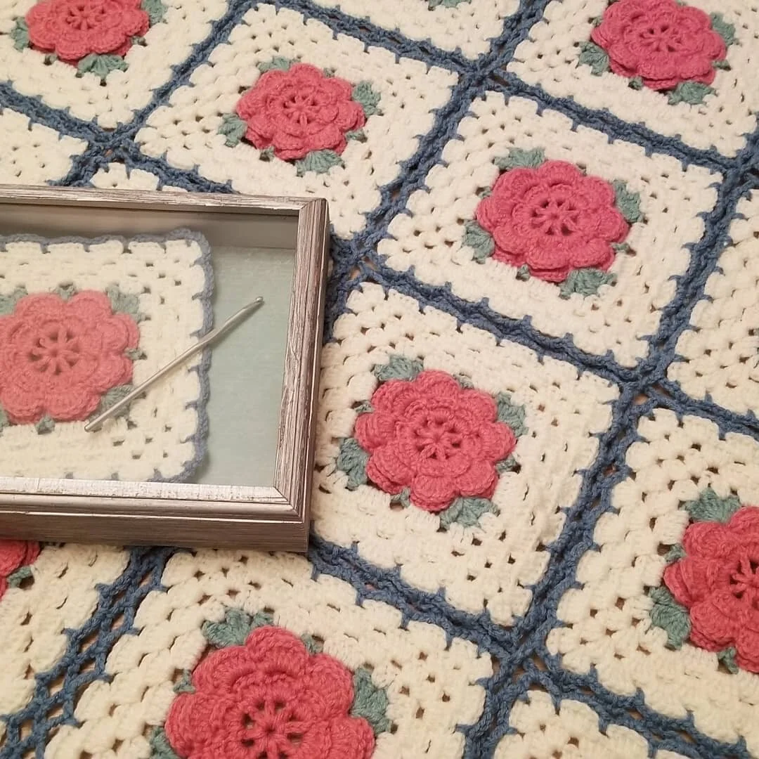 Crocheted blanket: the family asked me to complete it after the grandma wasn't able to. The shadow box held a granny square, the crochet needle grandma used, and the pattern.