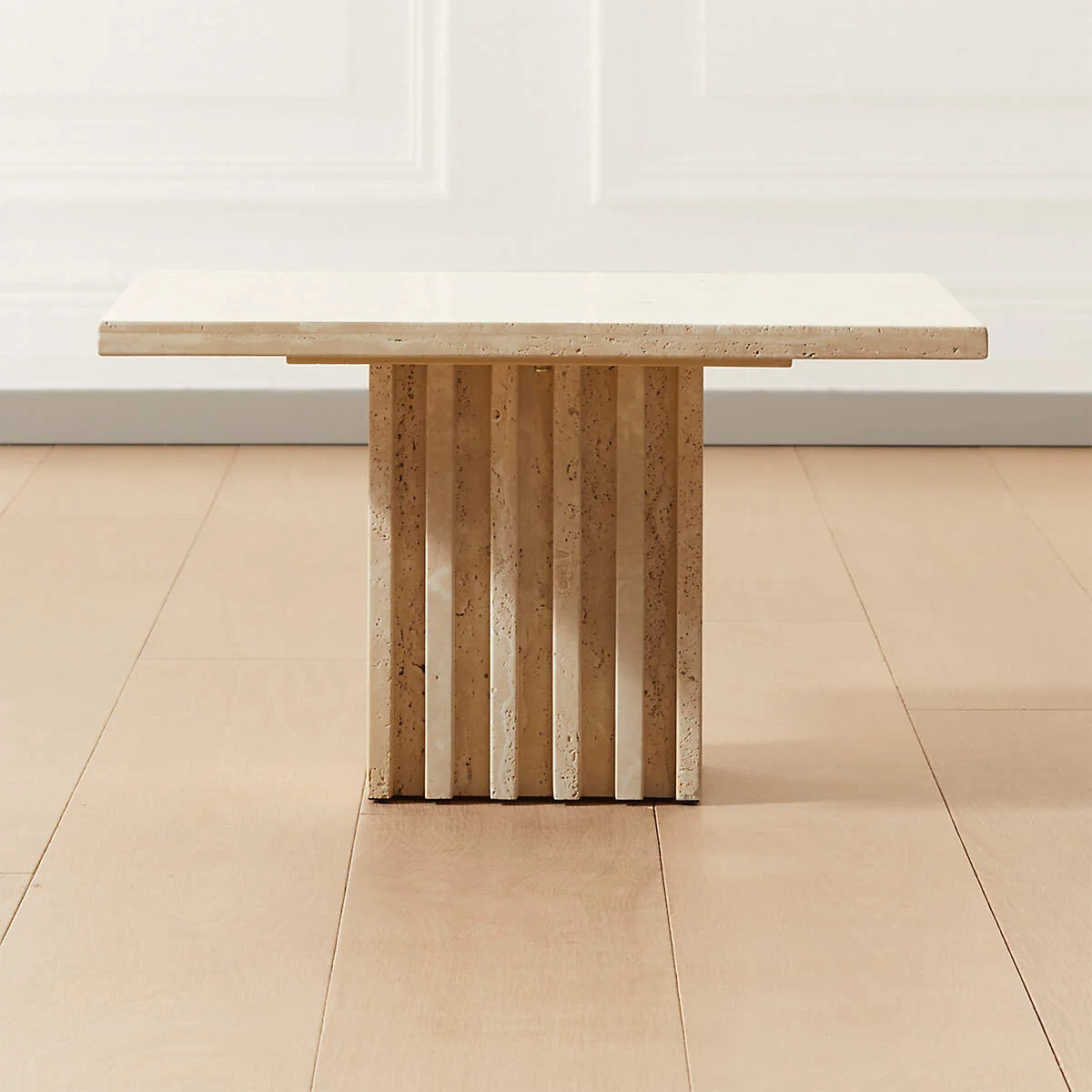 carve-travertine-small-cocktail-table.jpg