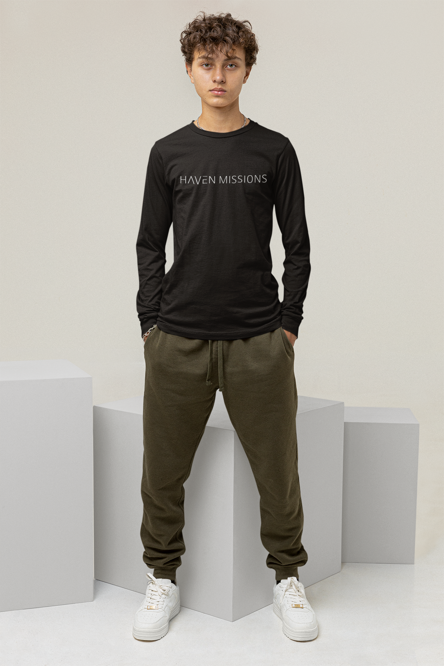 long-sleeve-tee-mockup-of-a-serious-man-standing-behind-some-cubes-and-looking-at-the-camera-m26218.png