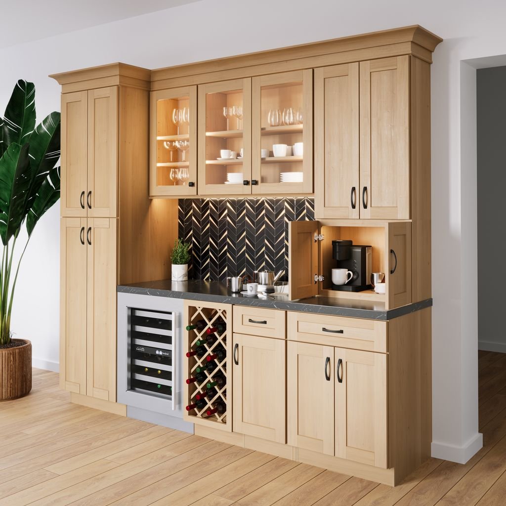 Kitchen bar area with light wood cabinets, glass-front upper cabinets, black backsplash, wine rack, mini fridge, coffee maker, potted plant, and hardwood flooring.