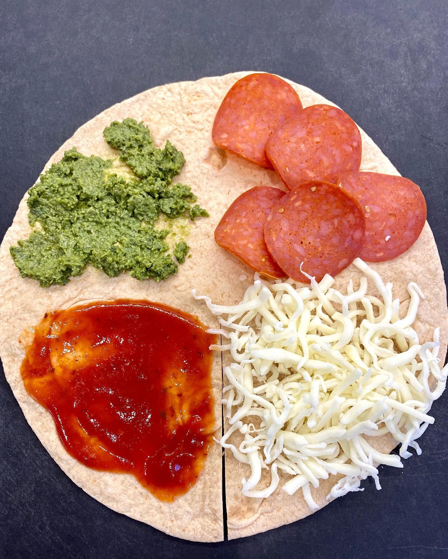 Pizzadilla! Have you tried this new wrap trend yet? It&rsquo;s genius. Especially for picky eaters and toddlers! Such a fun way to present food to them! Since you&rsquo;re folding it, it doesn&rsquo;t need to have cheese to hold together&mdash;you ca