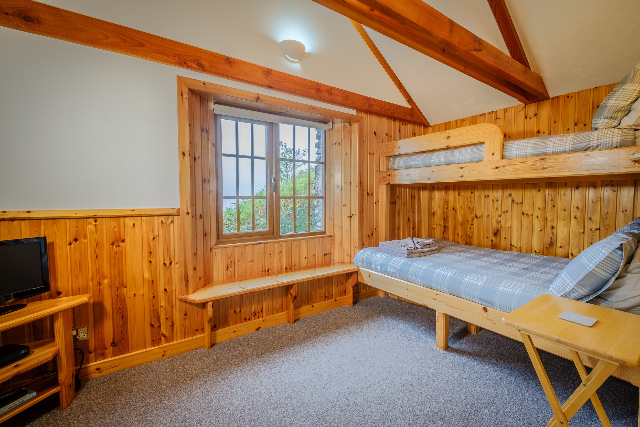 Byre bedroom. Double bunk bottom, single bunk on top. Camas bàn cottage, self catering cottage for 2 -4 people on the shorefront of Loch Sunart, Ardnamurchan (Copy)