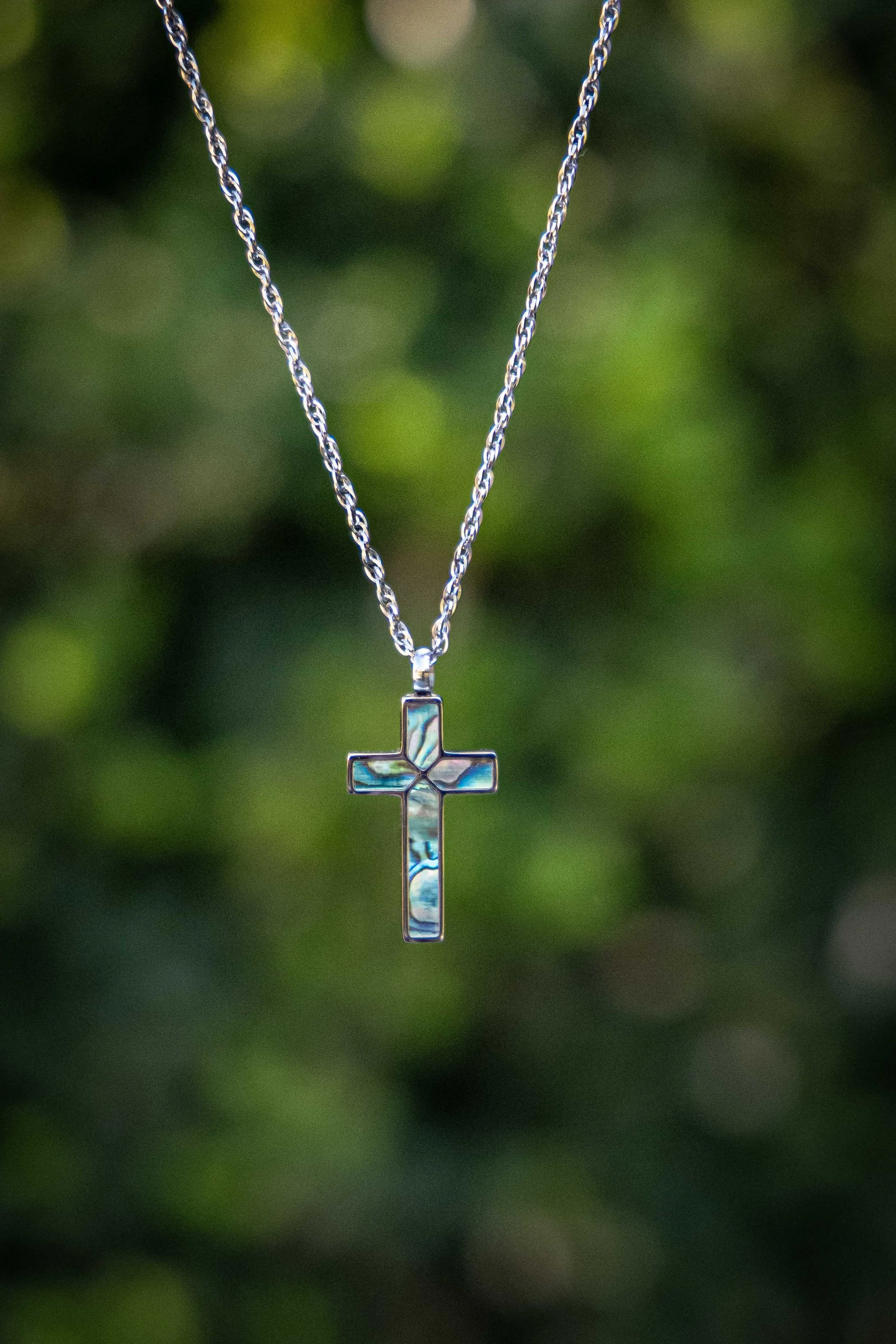 Stainless steel memorial cross necklace with paua inlay for pet ashes