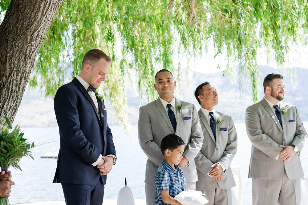 groom crying when he sees his bride