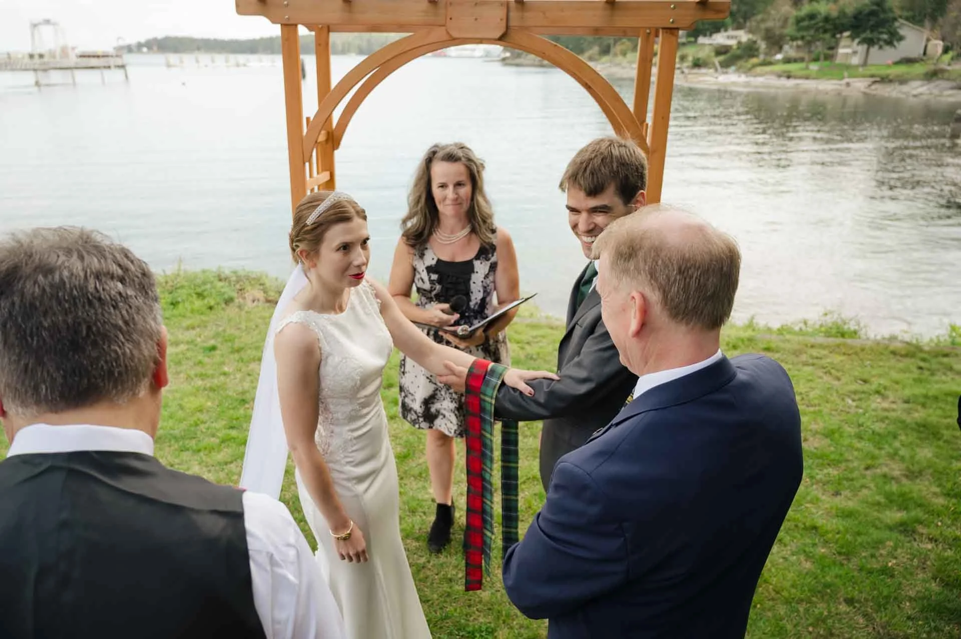 wedding officiant performing hand fasting ceremony