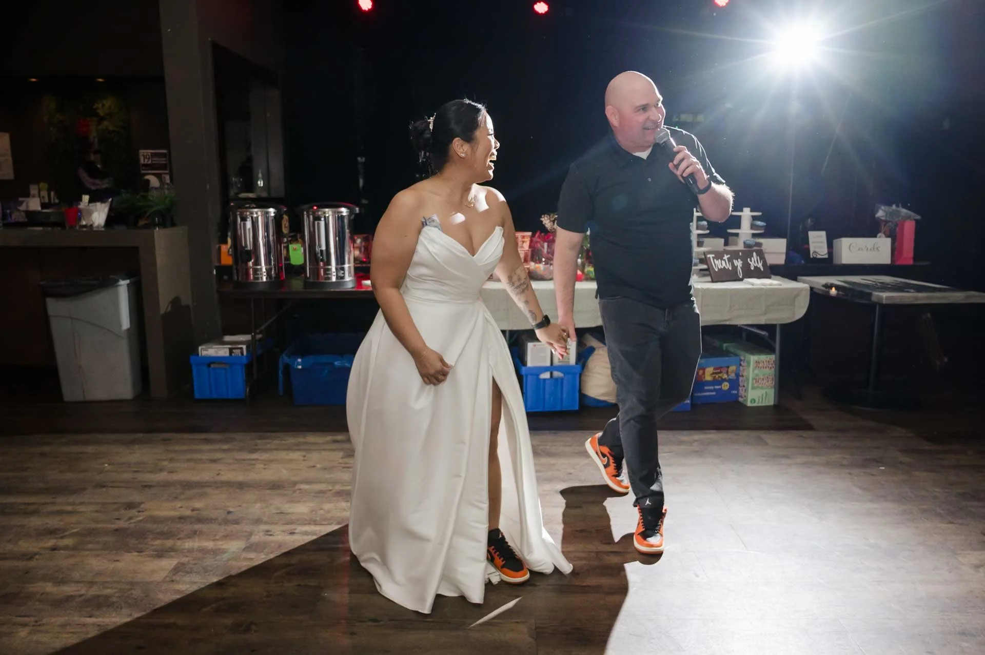 bride and groom giving a toast at their reception