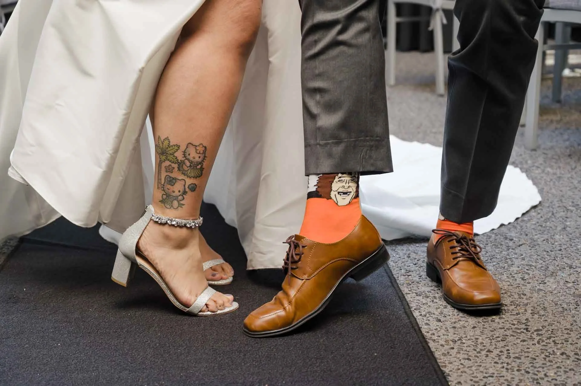 detail  photo of a bride and groom's footwear