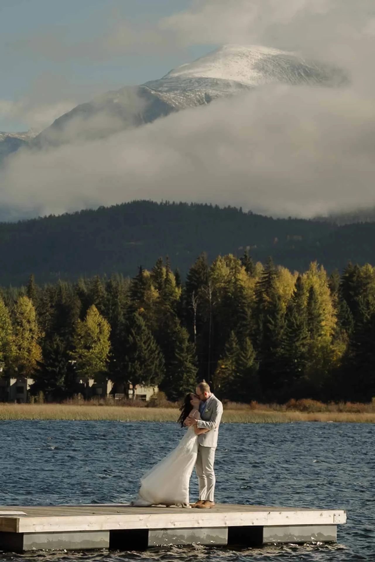 bride holding up her dress crossing the street in heels