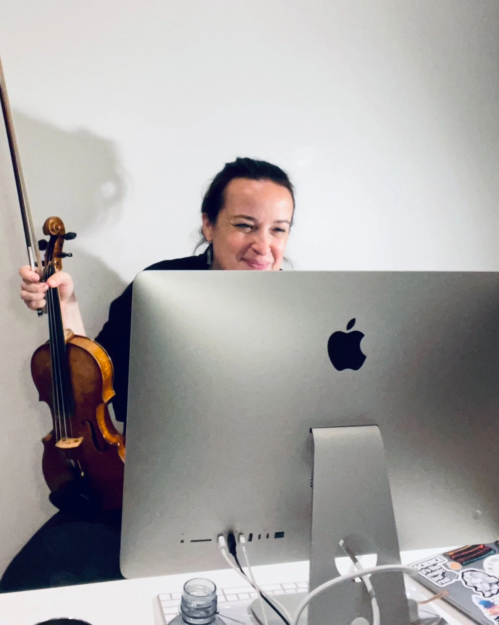 Dr. Mary-Elizabeth Brown giving a focused private violin lesson to an advanced student.