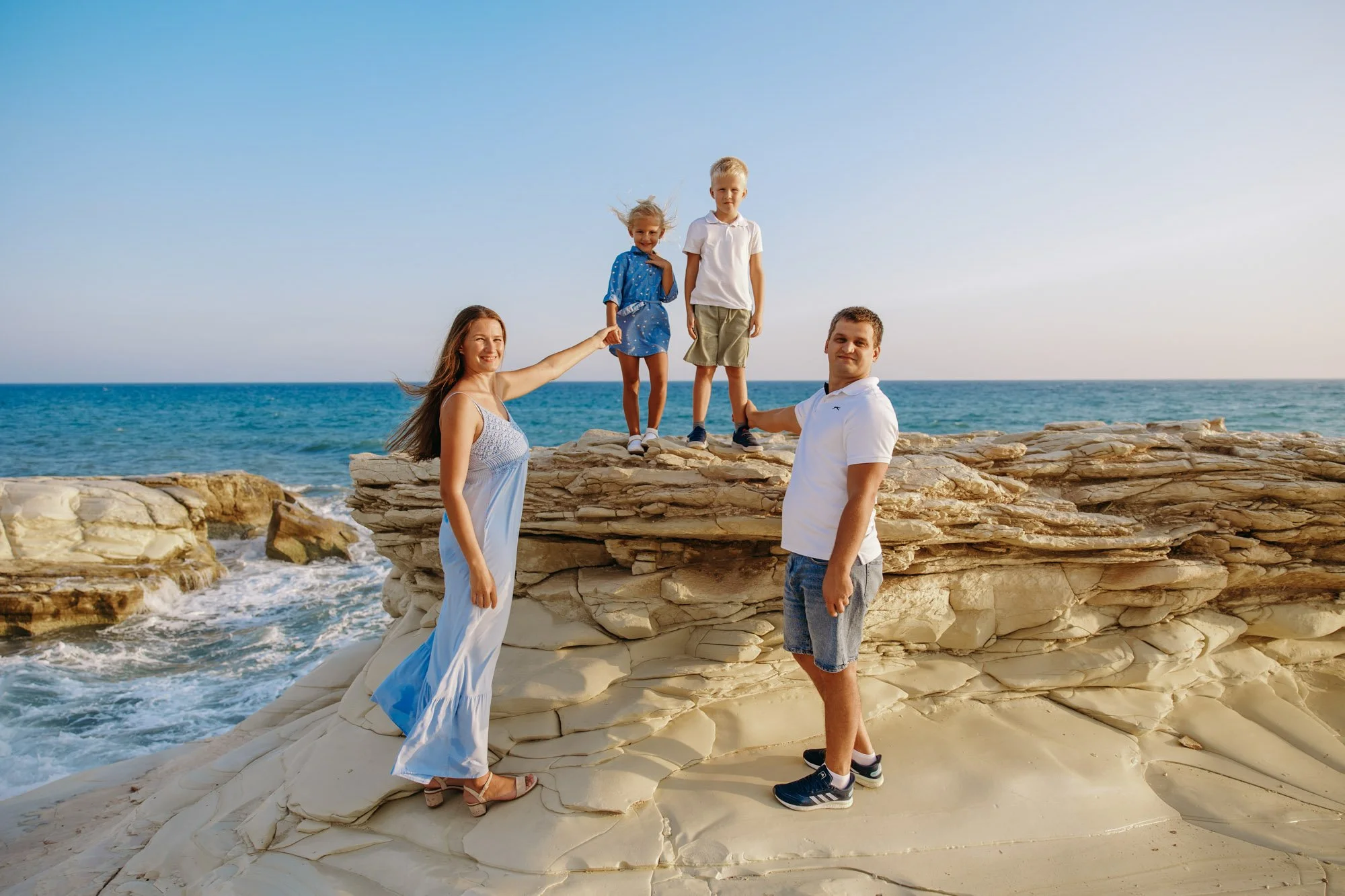 family exploring white rock formations Limassol White Stones coastal photoshoot Cyprus