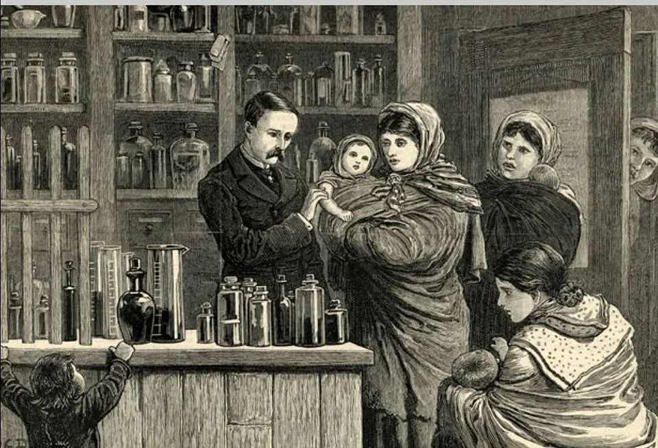 Inside a crowded apothecary or dispensary, a group of women wait with quiet urgency as a man behind the counter — possibly a doctor or pharmacist — tends to a baby. The mother holds the child out with both hands, her shawl still drawn snug across her