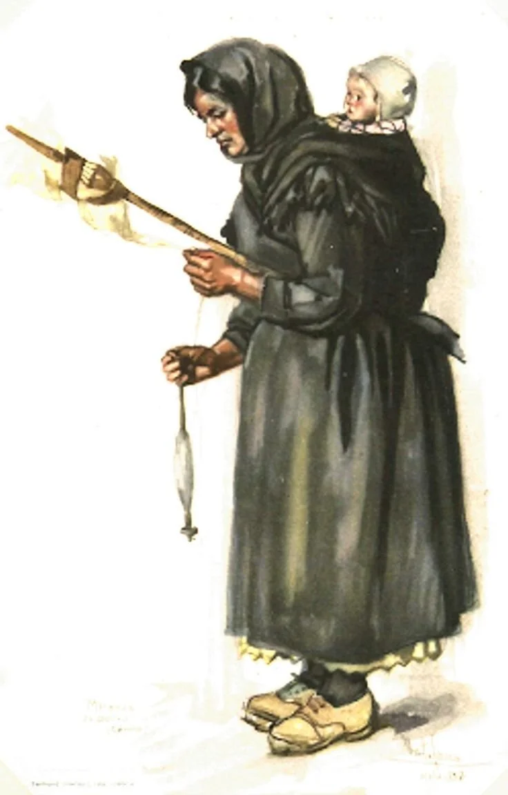 This illustration depicts a woman from the Mezzogiorno region of southern Italy, carrying a baby on her back while spinning wool with a drop spindle. Dressed in a heavy dark cloak and scarf, she is captured in mid-motion—her hands deftly working as h