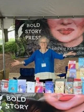 Emily at Bold Story Press booth at Book Fair