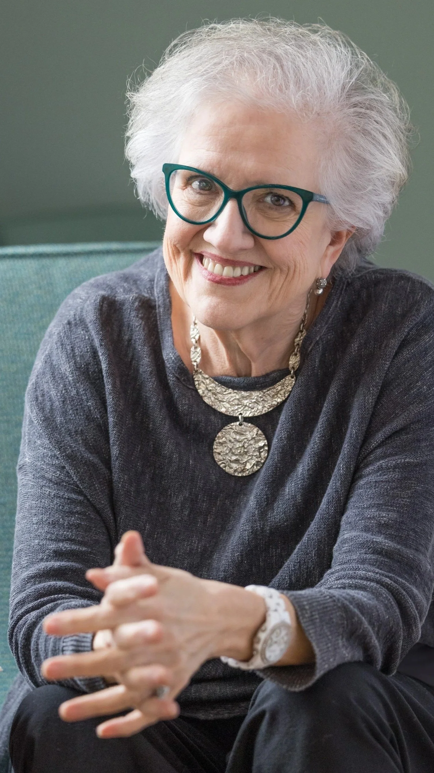 Emily Barrosse, Publisher, sitting smiling