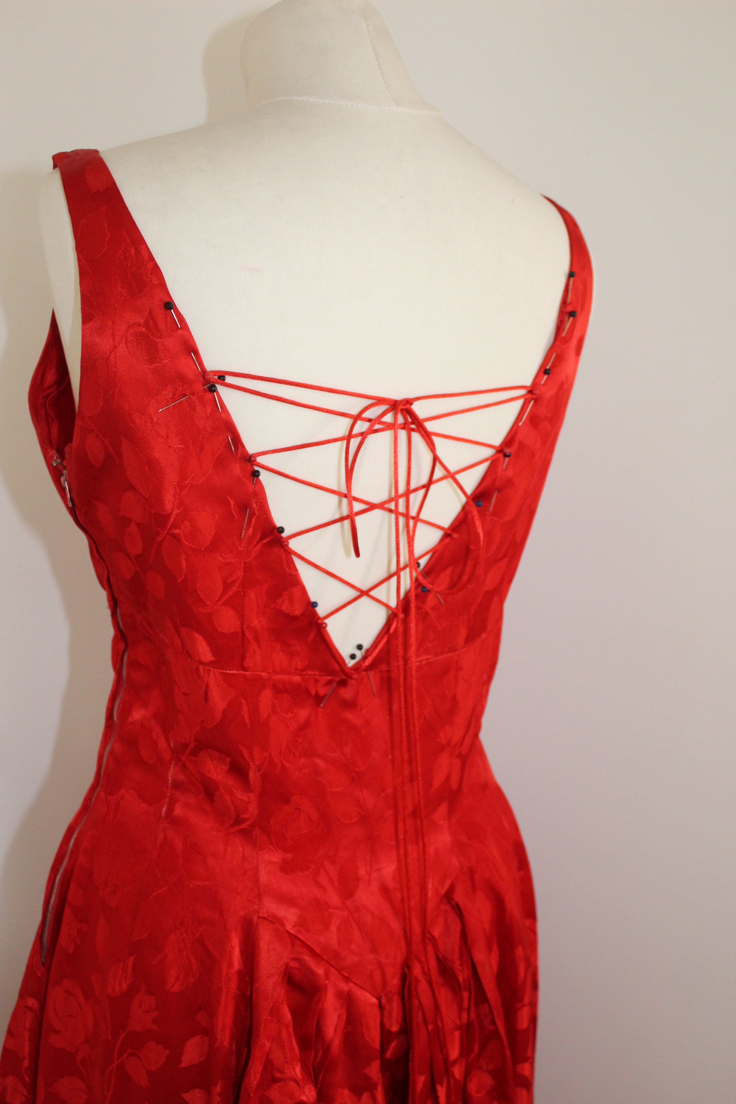 1950 Vintage Prom dress in  red silk. The idea was to give a modern twist to this vintage dress by adding a lacing with a very fine matching ribbon. 