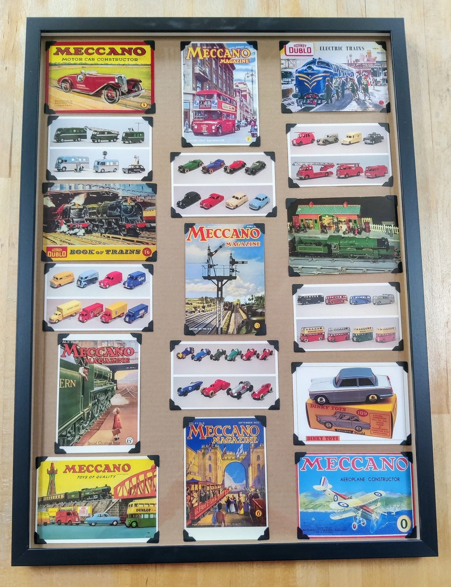 A display of Meccano, Hornby & Dinky Toys postcards