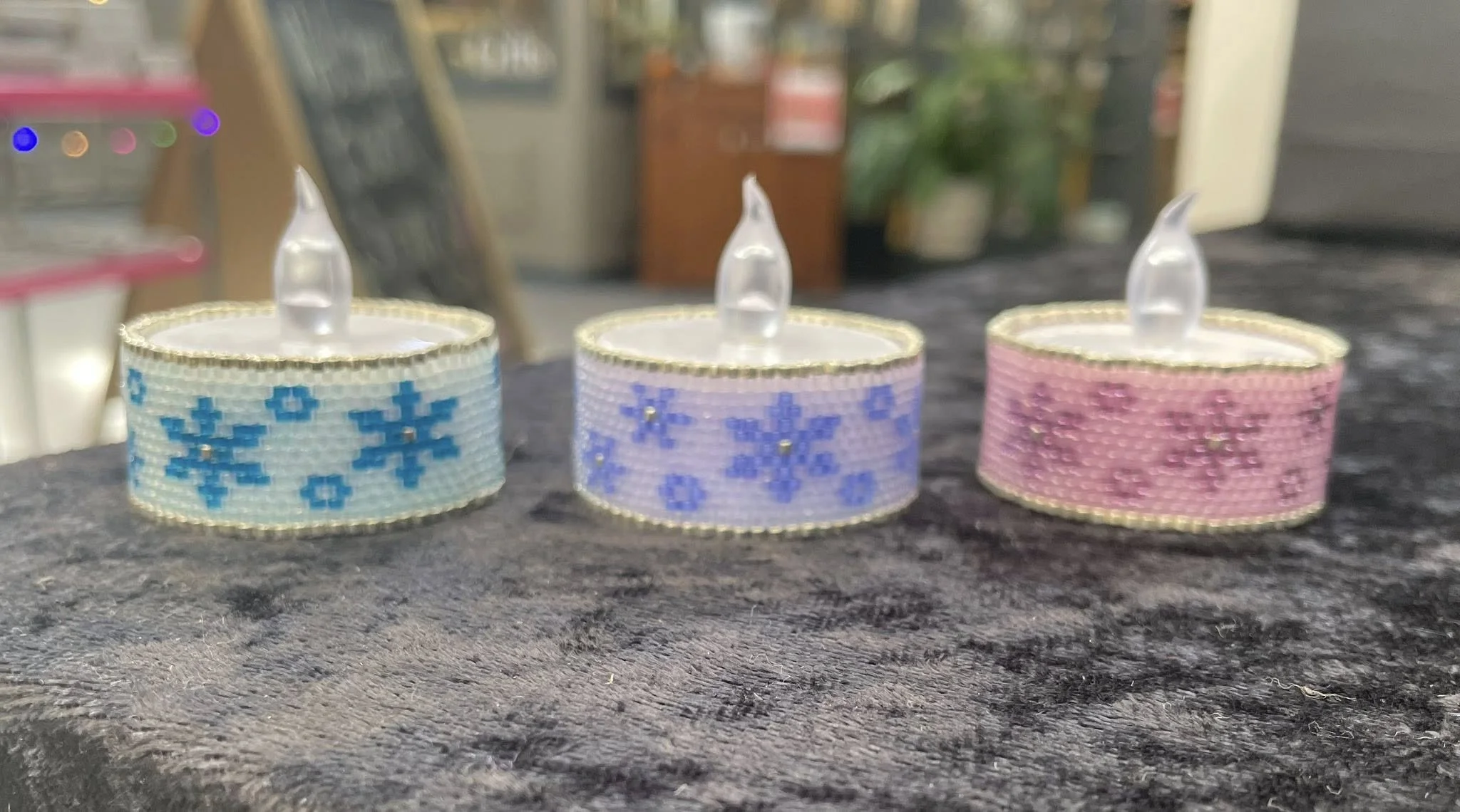 three snowflake tea lights 2025.jpg