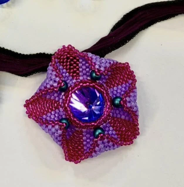 round about pendant fucshia.jpg