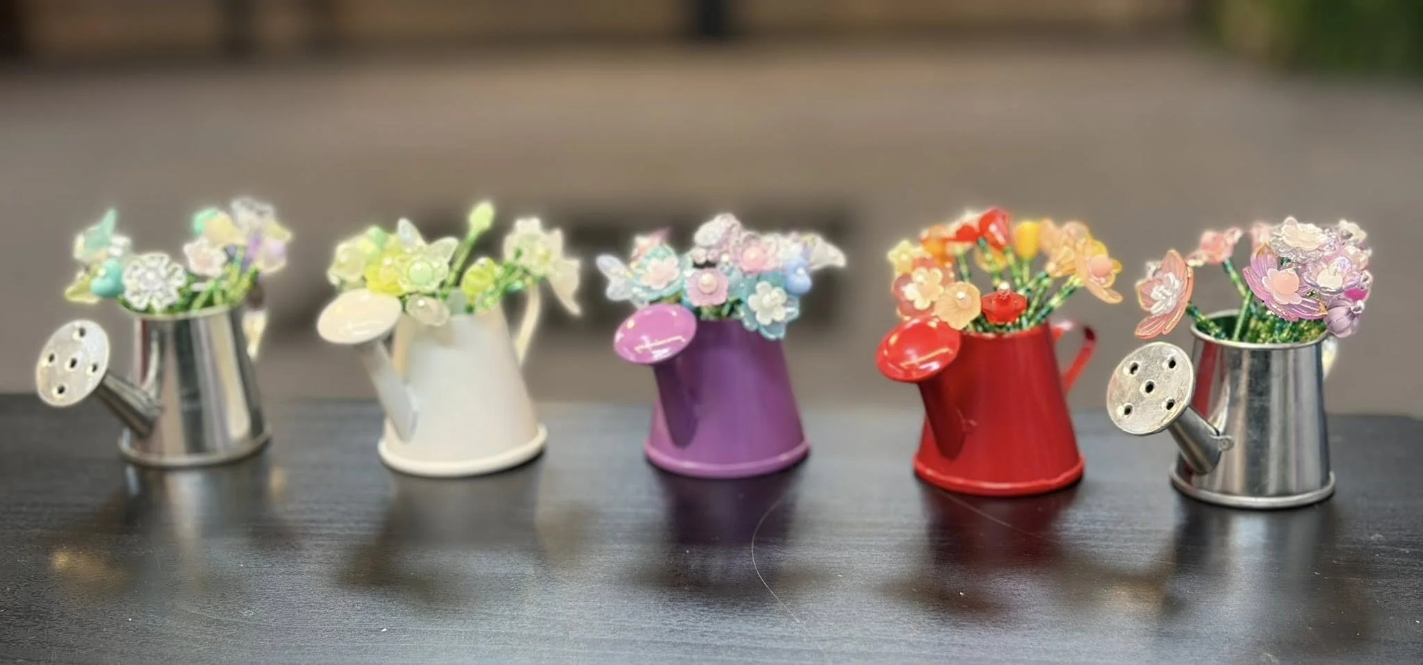 watering cans may 2026.jpg