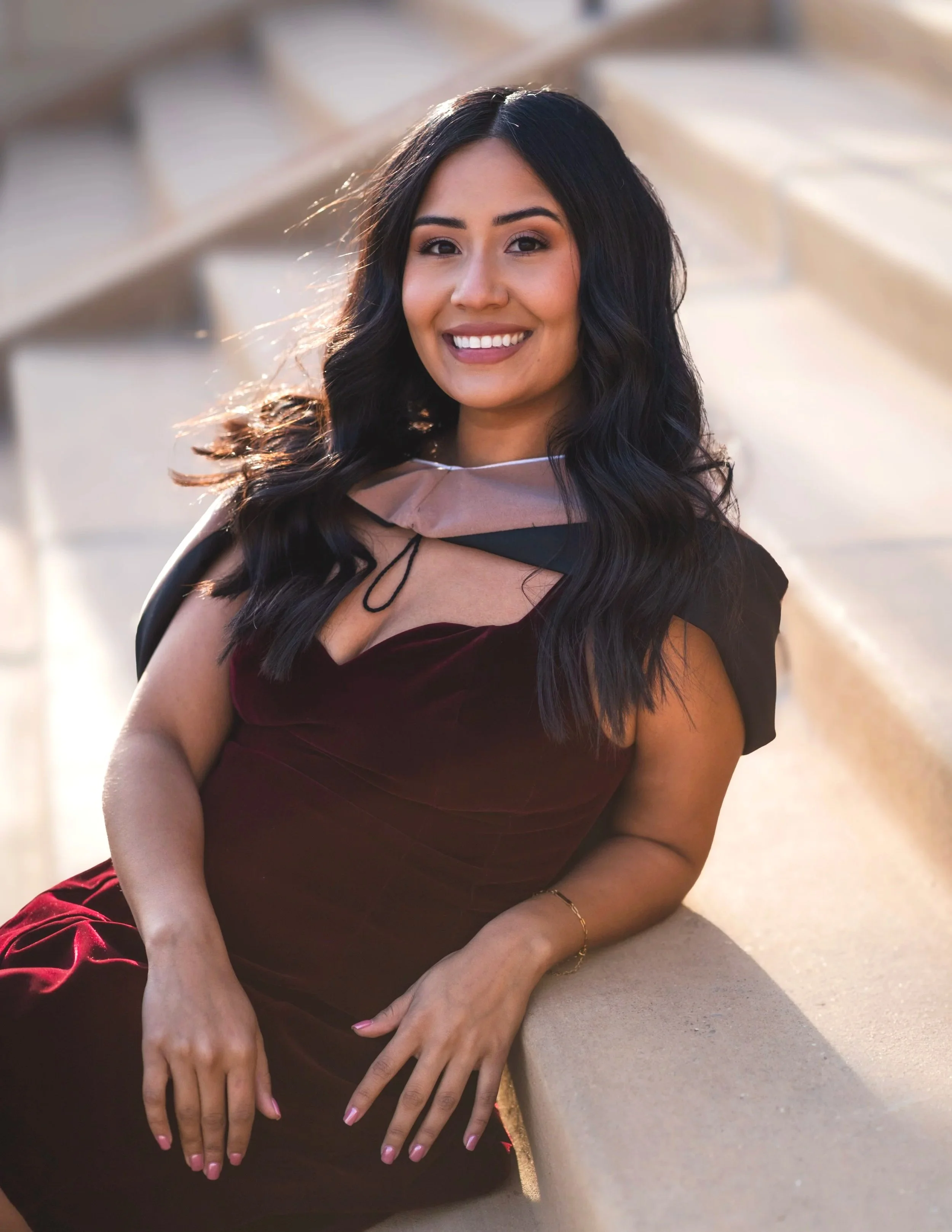 Senior portrait session in Amarillo Texas capturing a natural outdoor golden hour portrait with a soft architectural background