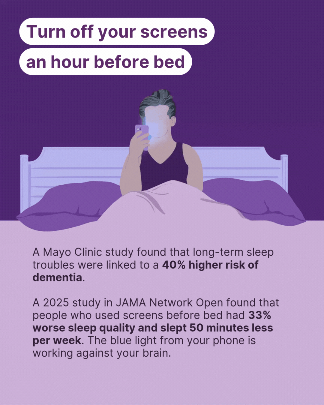 woman looking at cell phone screen in bed in the dark
