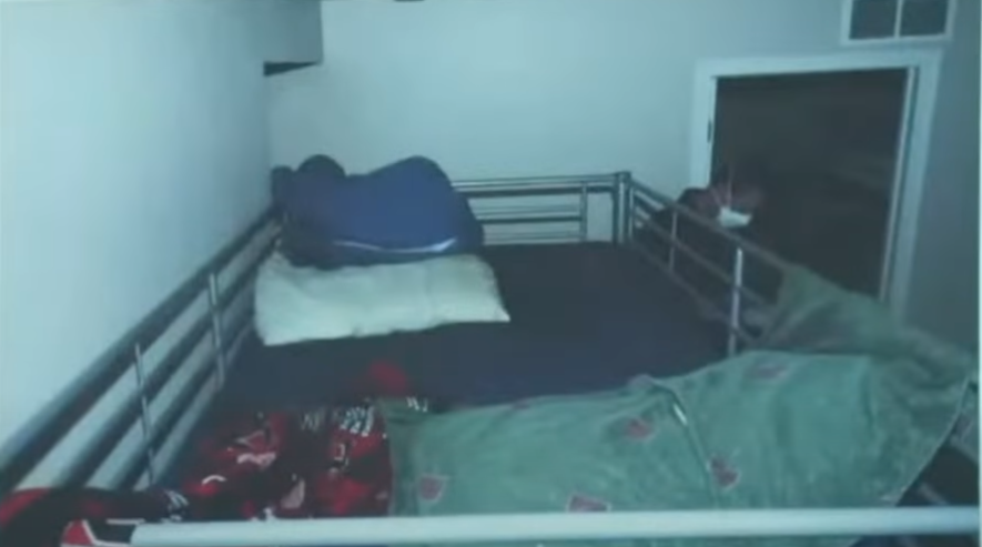  Timothy’s top bunk. The man in the photo is another police officer. He’s standing in front of the doorway to Gideon’s bedroom 