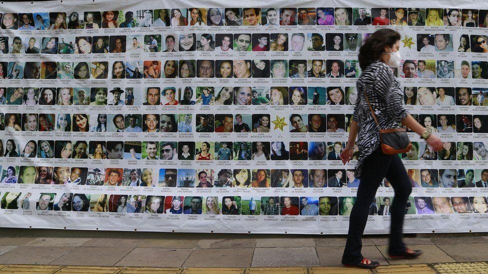  A banner displaying the photos of the 242 people who died was hung in Porto Alegre 