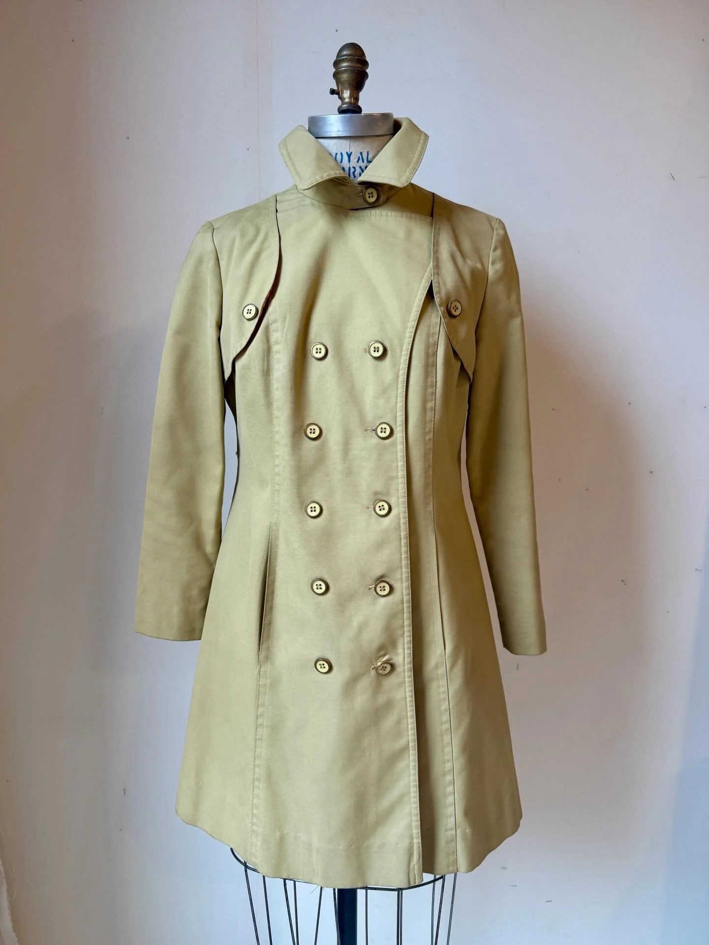 Not your average trench🌤️
⠀⠀⠀⠀⠀⠀⠀⠀⠀
Early 1970s khaki trench with brass &amp; enamel novelty buttons. The kind of cheeky detail you can only find with vintage.
⠀⠀⠀⠀⠀⠀⠀⠀⠀
Coming with us to @ouroriginalstory this weekend!! Find us @ 64 Dobbins St this