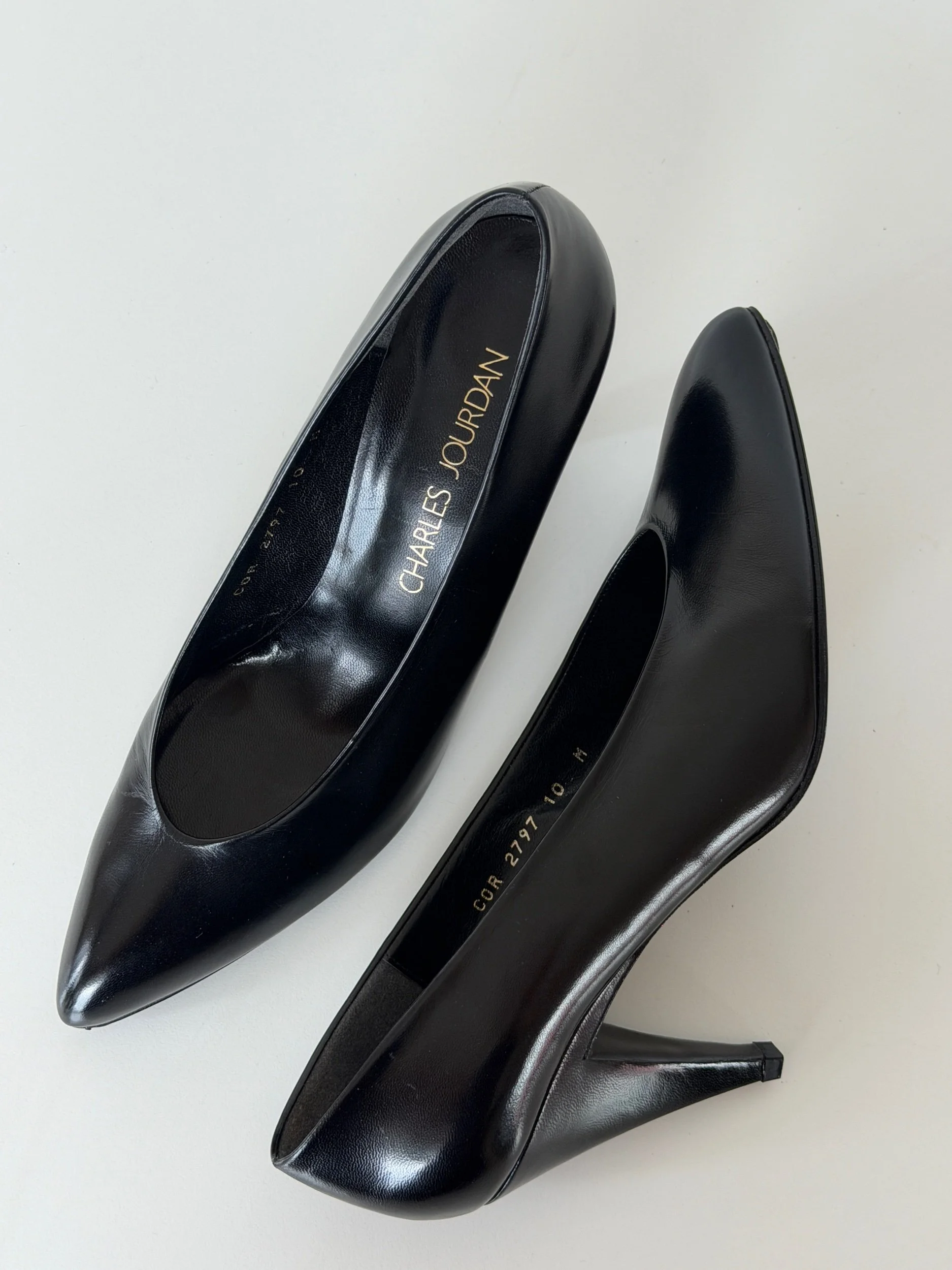 Vintage Charles Jourdan black leather pointed toe pumps with sculpted stiletto heel