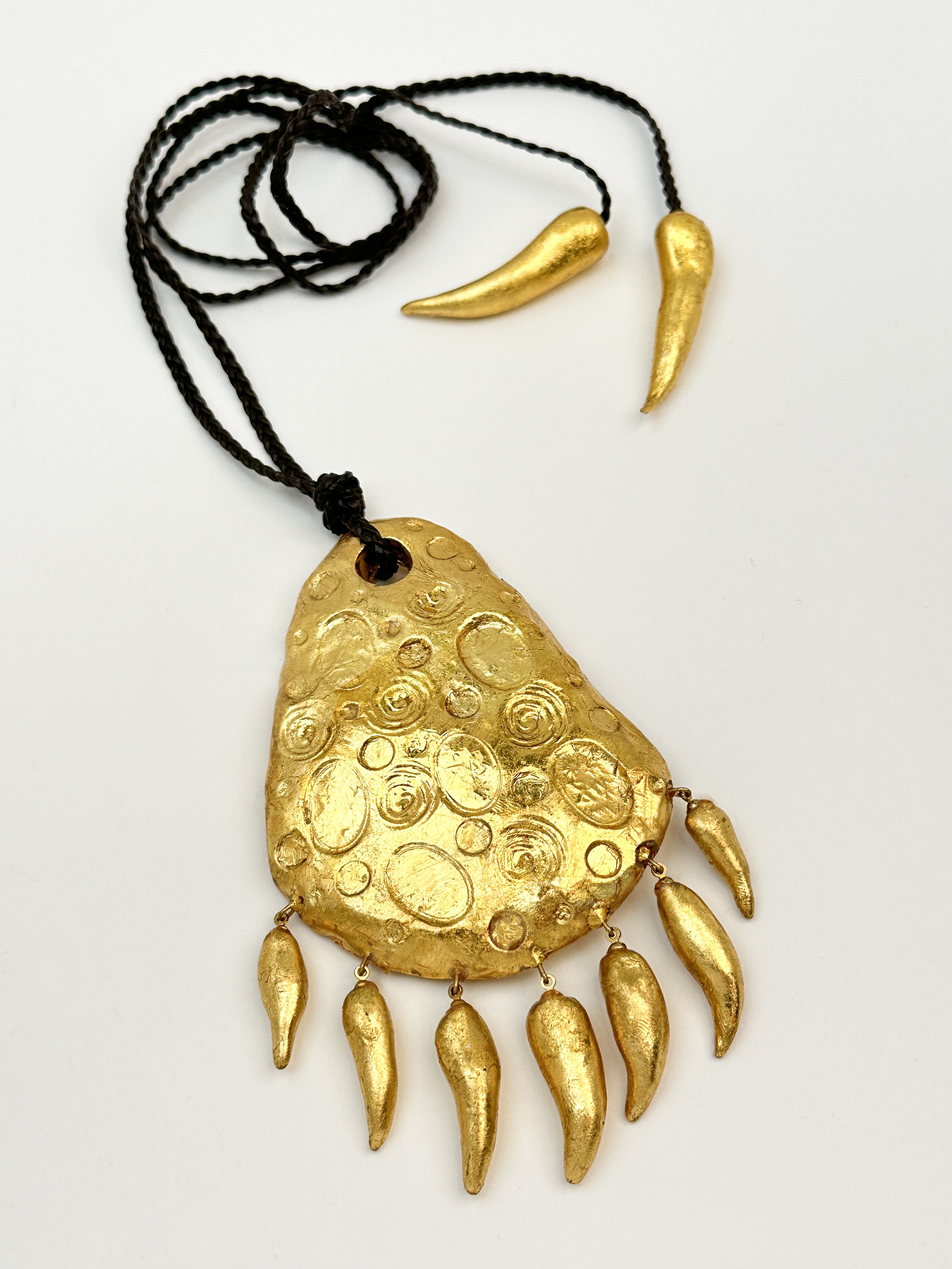 Relic Pendant with Seven Horns