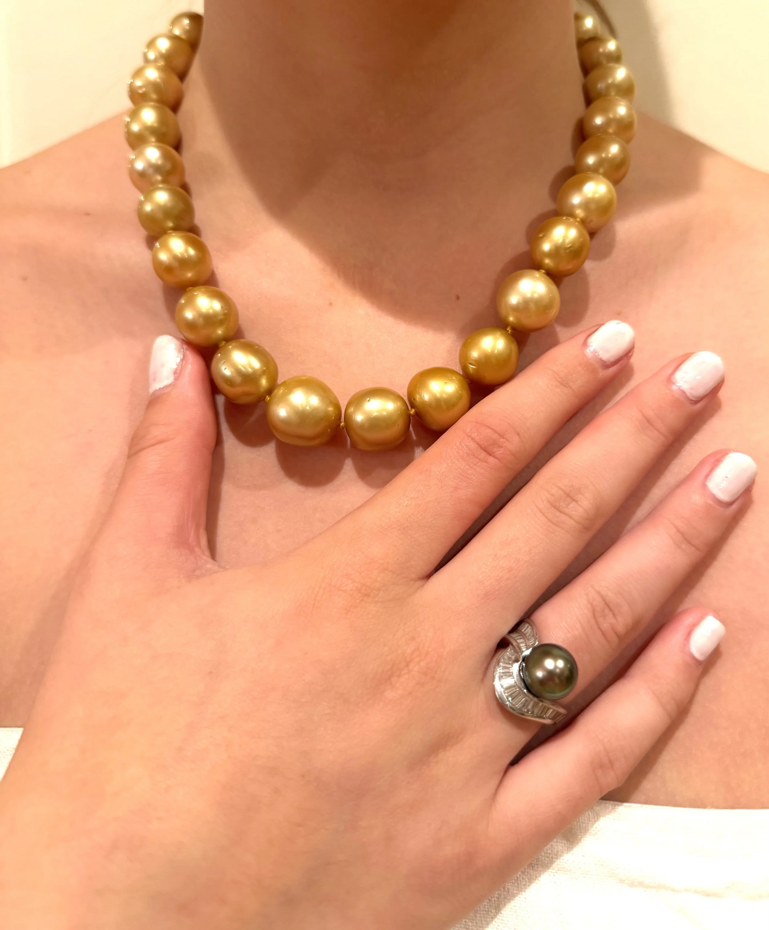 2.c abricot pearl necklace and peacock pearl ring closer.jpg
