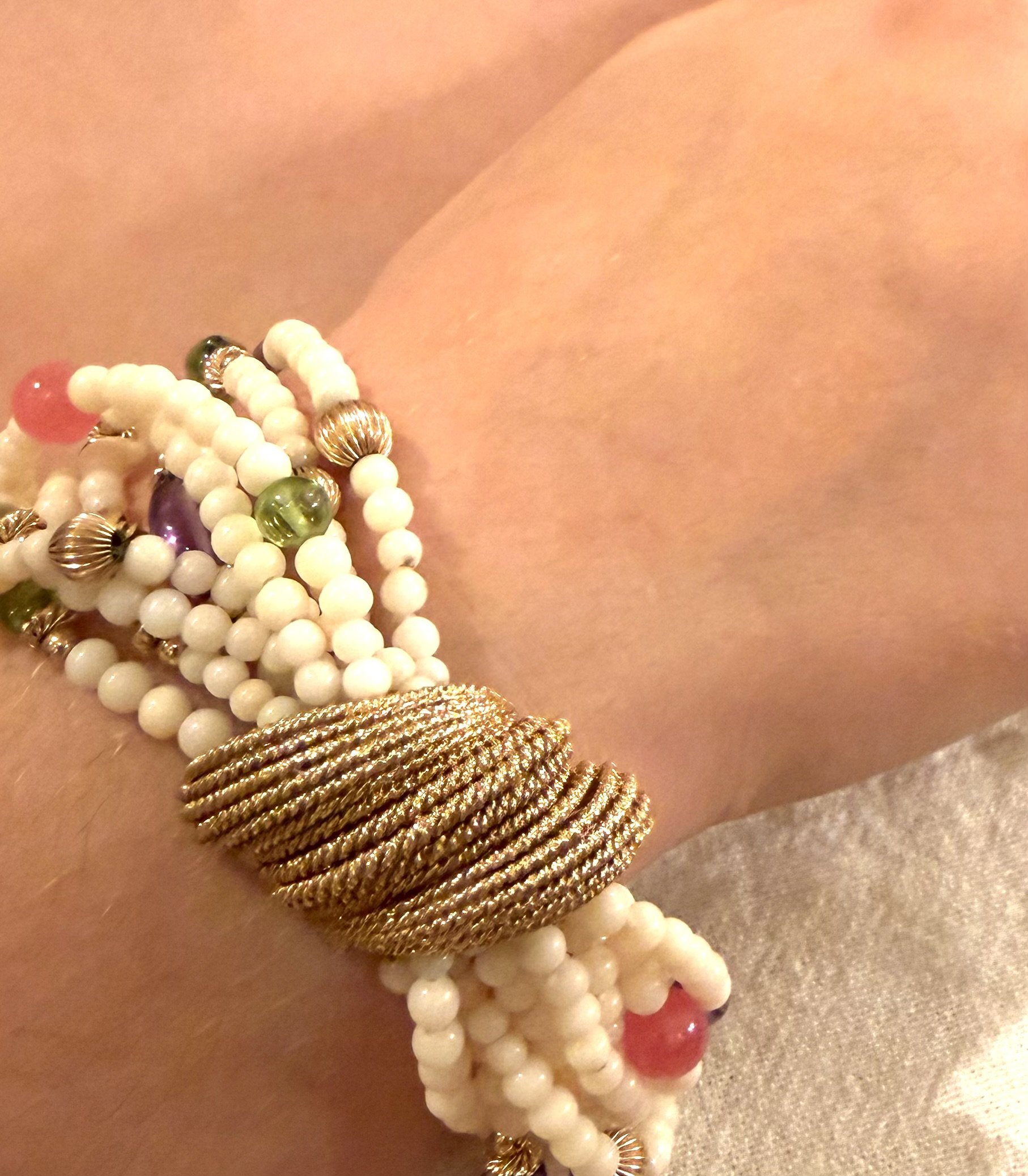 7.c coral bracelet on wrist.jpg