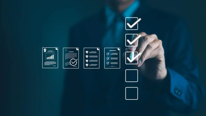 Remote IT professional using digital checklist to manage laptop tracking during employee offboarding