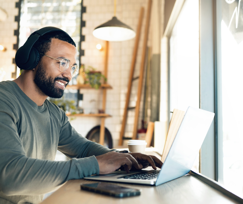 Remote employee using a company laptop, representing employee laptop return challenges and remote employee offboarding.