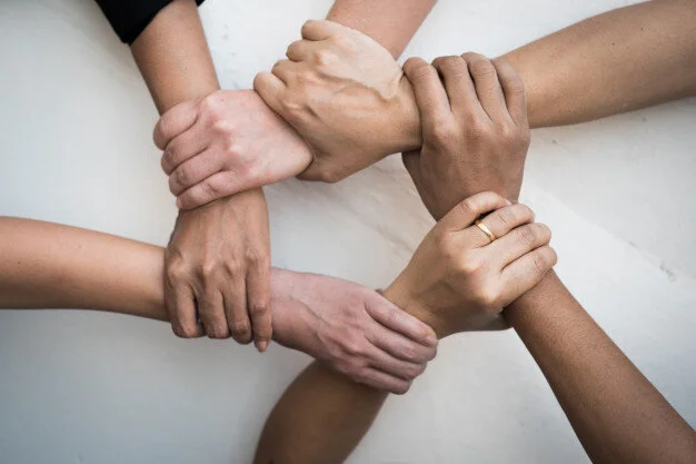 people-united-hands-together-teamwork_55877-572.jpg