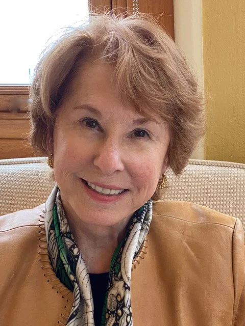Winnie Simpson practiced law in Atlanta, GA, before retiring to Traverse City. She lives in Building 50 and has served on the boards of both the Mercato and Village Site Associations. Between hiking the trails at the Commons and biking the TART trail
