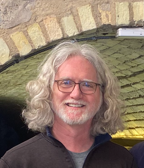 Tak Ready grew up in Slabtown in Traverse City, just blocks away from the State Hospital when it was still in operation. The Commons was an extended playground for him. Tak has taught history and government at Traverse City West Senior High School si